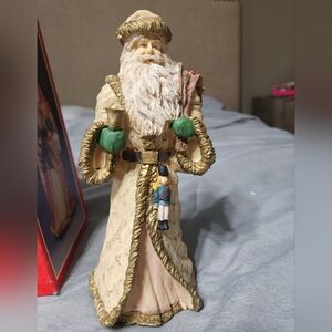 Vintage Santa Claus Figurine with Green Accents
